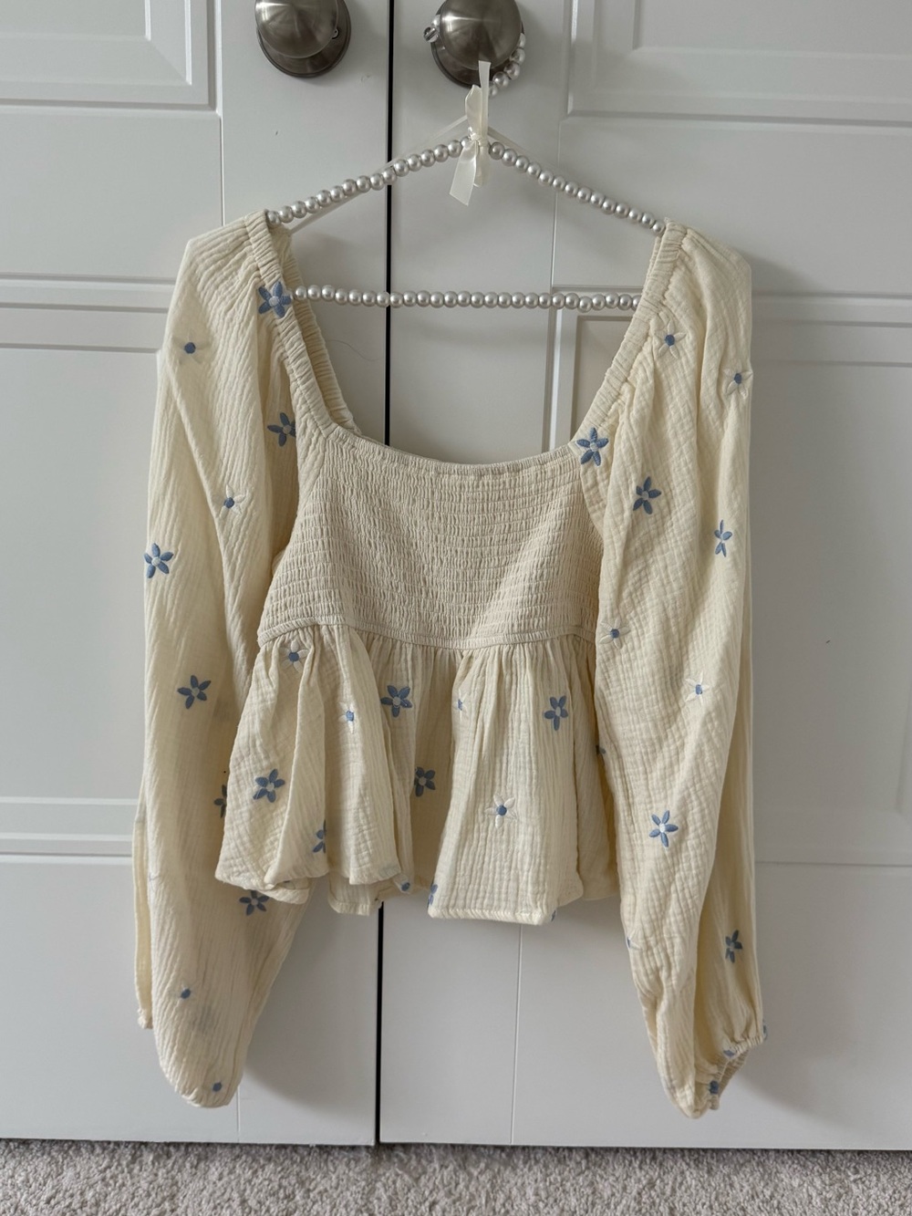 Altard state Cream Smocked Peplum Long-Sleeve Top with Blue Floral Embroidery
